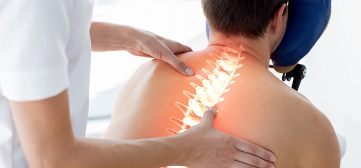 A patient with osteochondrosis at the doctor's examination
